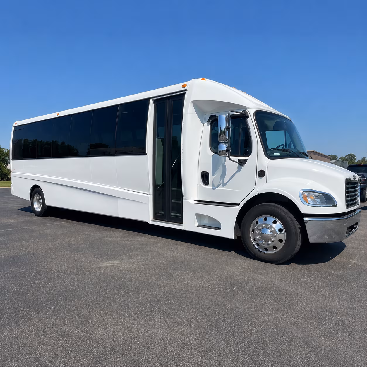 corporate airport transfer buses between lawrence and kansas city international