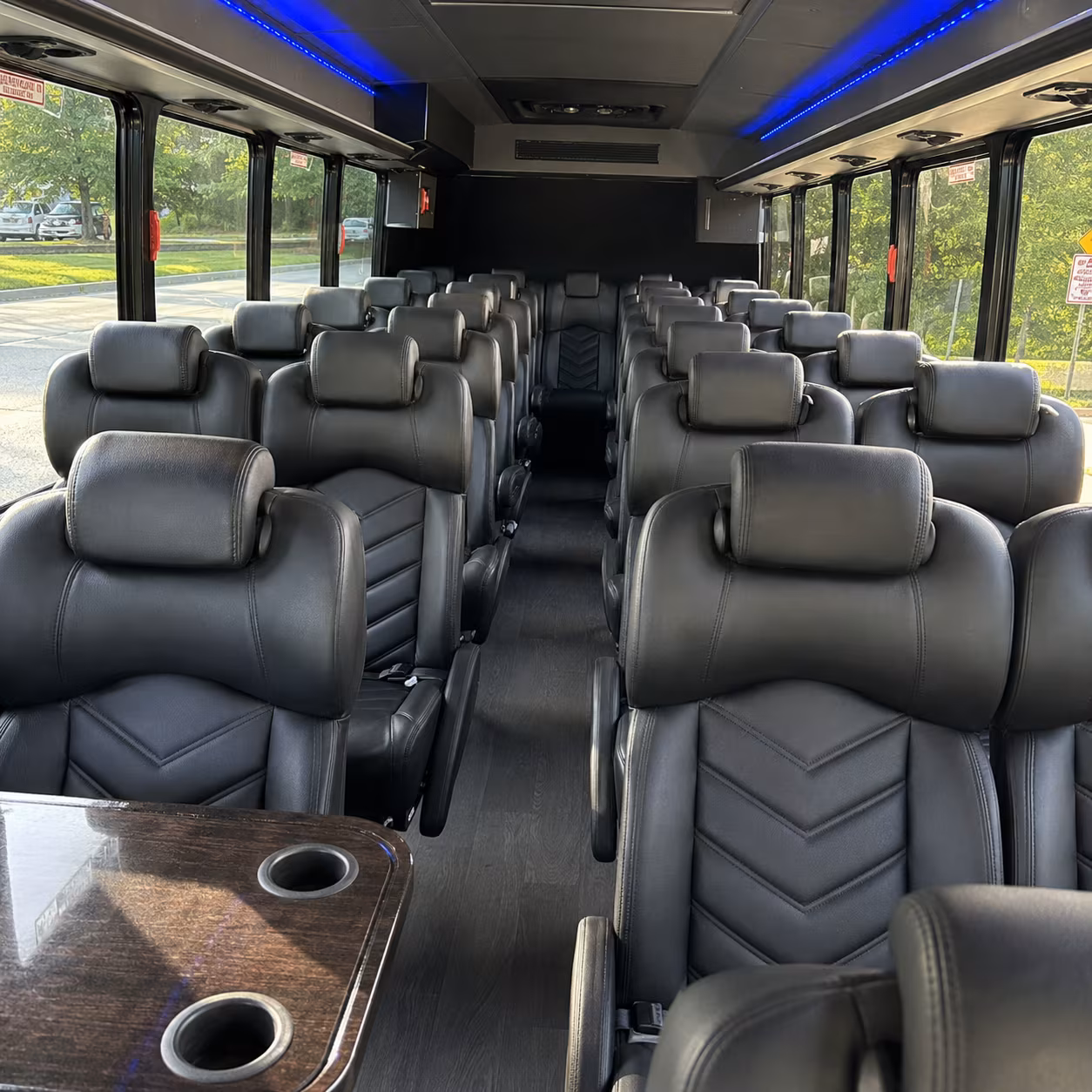 what kind of bus are you looking for and how does that change the price in lawrence